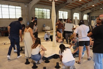 Students working on large-scale modular prototype.